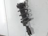 Front shock absorber with coil spring 