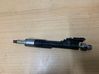 Fuel injector 7597870