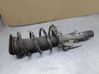 Front shock absorber with coil spring 