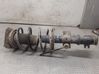 Front shock absorber with coil spring 