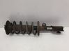 Front shock absorber with coil spring 