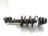 Front shock absorber with coil spring 