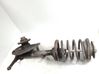 Front shock absorber with coil spring 