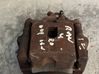Caliper de freno delantero 