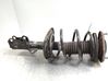 Front shock absorber with coil spring 