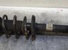 Front shock absorber with coil spring 
