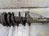 Front shock absorber with coil spring 