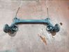 Rear axle beam with reductor 