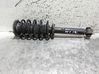 Front shock absorber with coil spring 