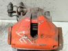 Caliper de freno delantero 