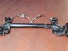 Rear axle beam with reductor 