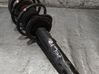 Front shock absorber with coil spring 