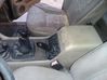 Apoyabrazos del asiento trasero 