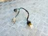 Tail light bulb cover holder 
