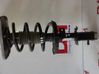Front shock absorber with coil spring 
