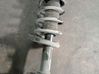 Front shock absorber with coil spring 