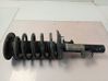 Front shock absorber with coil spring 