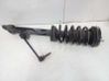 Front shock absorber with coil spring 