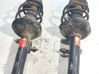 Front shock absorber with coil spring 7572921