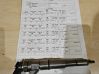 Fuel injector 7788609