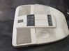 Headlining lighting console trim 
