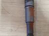 Fuel injector 7788812