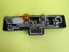Tail light bulb cover holder 