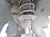Front shock absorber with coil spring 