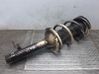 Front shock absorber with coil spring 
