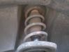 Front shock absorber with coil spring 