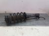 Front shock absorber with coil spring 