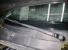 Front wiper blade arm 
