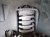 Front shock absorber with coil spring 