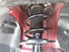 Front shock absorber with coil spring 