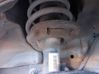 Front shock absorber with coil spring 