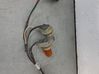 Tail light bulb cover holder 