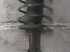 Front shock absorber with coil spring 