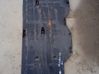Center/middle under tray cover 
