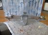 Front wiper blade arm 