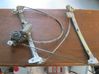 Front door electric window regulator 