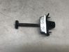 Rear door check strap stopper 