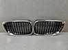 Front bumper upper radiator grill 7042961