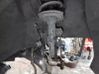 Front shock absorber with coil spring 