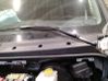 Front wiper blade arm 
