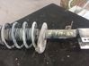 Front shock absorber with coil spring 