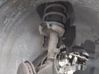 Front shock absorber with coil spring 