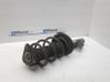 Front shock absorber with coil spring 