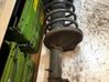 Front shock absorber with coil spring 