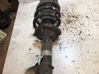 Front shock absorber with coil spring 