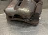 Caliper de freno delantero 